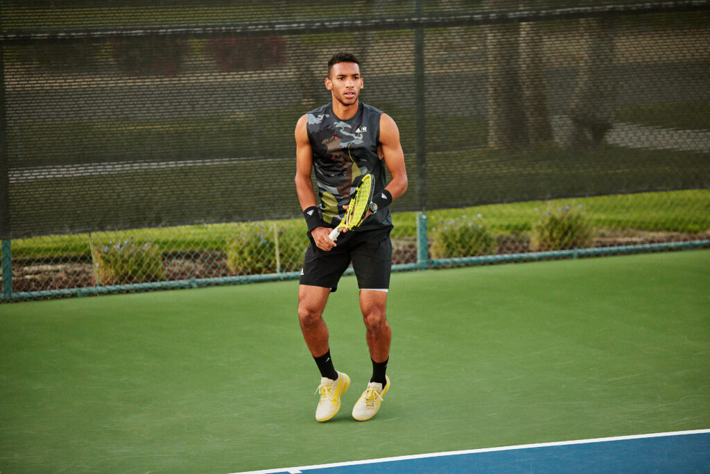 Félix Auger-Aliassime training in the Thebe Magugu x adidas tennis collection ahead of the U.S. Open 2022.
