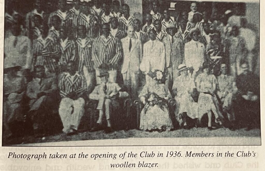 Black-and-white photo of Yoruba Tennis Club members in Lagos wearing striped blazers, 1936.