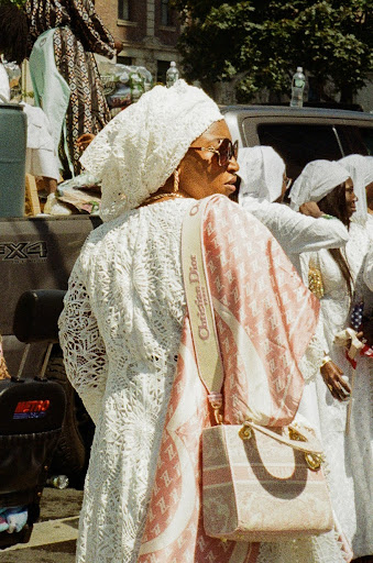 Woman in elegant white attire.