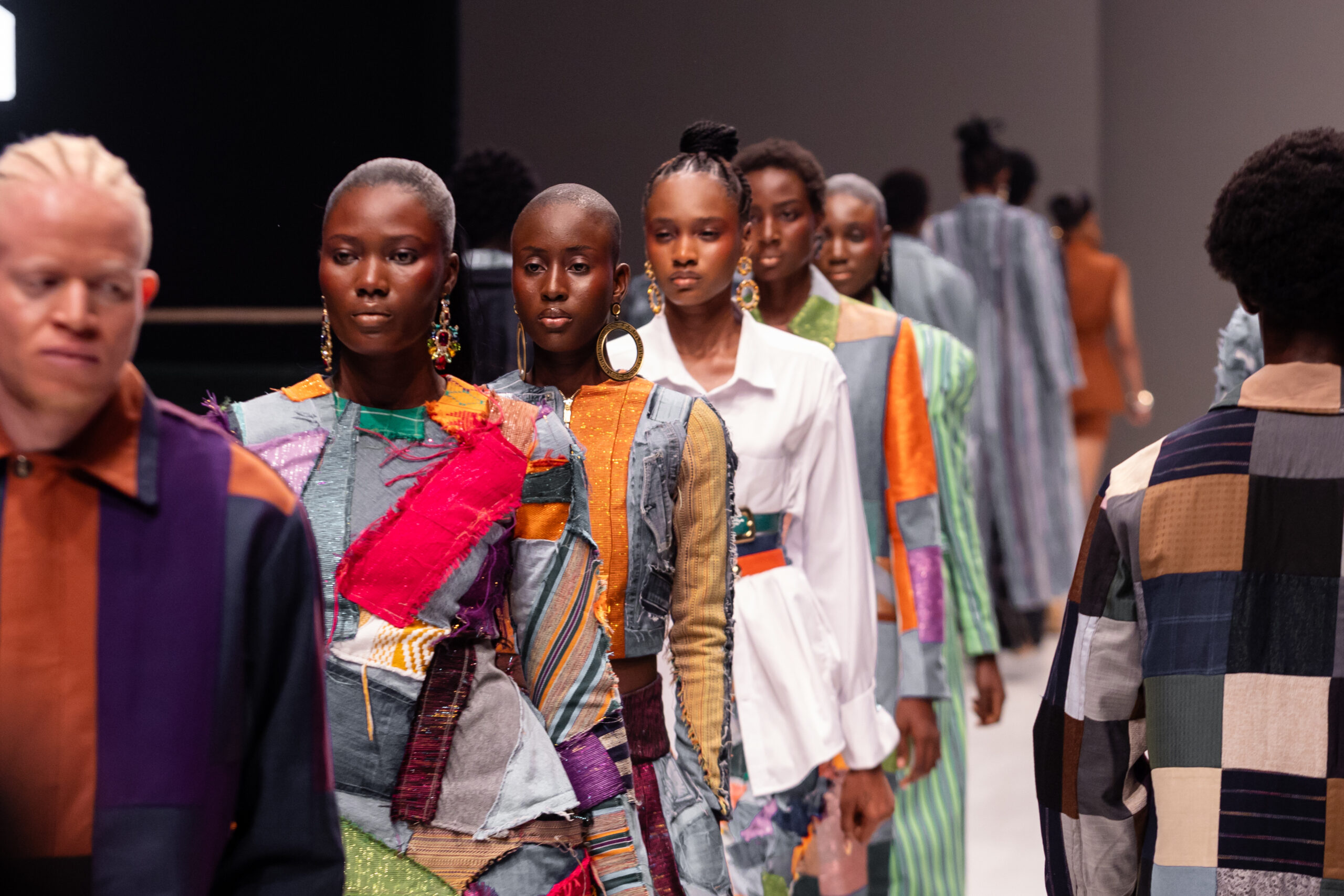 Models walking in colorful wear by Boyedoe for Lagos Fashion Week