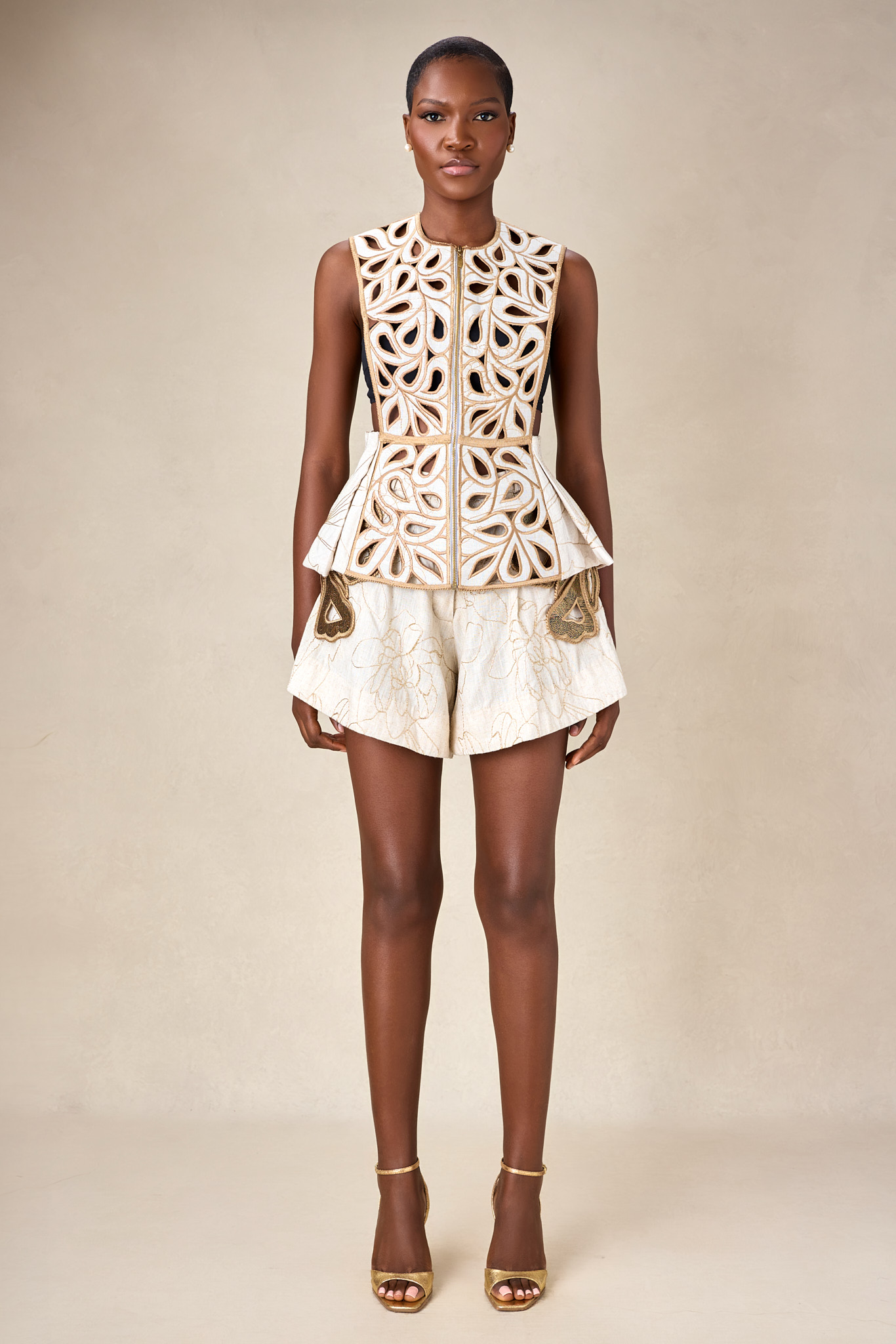 Ivory vest and Capri shorts