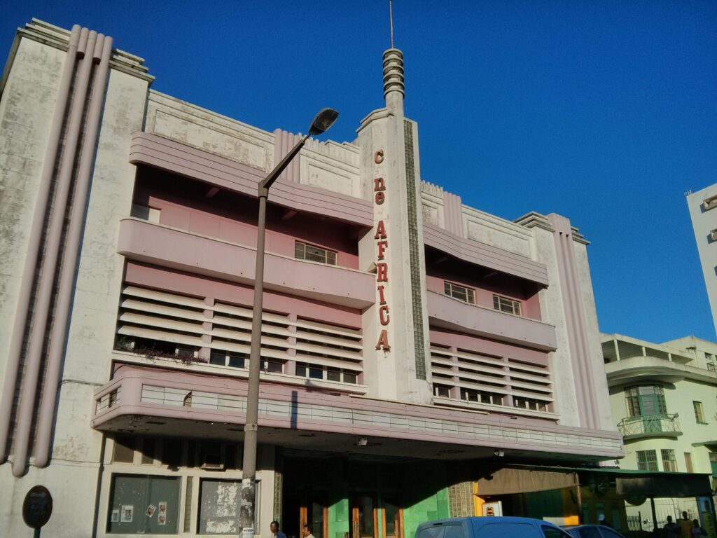 Art Deco cinema facade with speed lines and central glazed pillar. Cine Africa, originally Cinema Manuel Rodrigues, 1948, Maputo, Mozambique. 