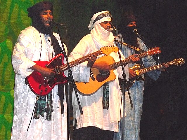 The Blues That Never Left Africa 3 Tinariwen performing at Weltmusikfestival Horizonte 2008 in traditional Tuareg dress with guitars