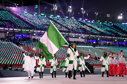Flag bearer Ngozi Onwumere leads Nigeria's team into the stadium at the PyeongChang Winter Olympics opening ceremony