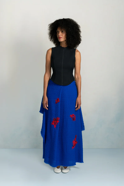 Amayi Archive One: black structured corset top with cobalt blue layered maxi skirt and hand-embroidered red floral motifs, Joanna Masiyiwa
