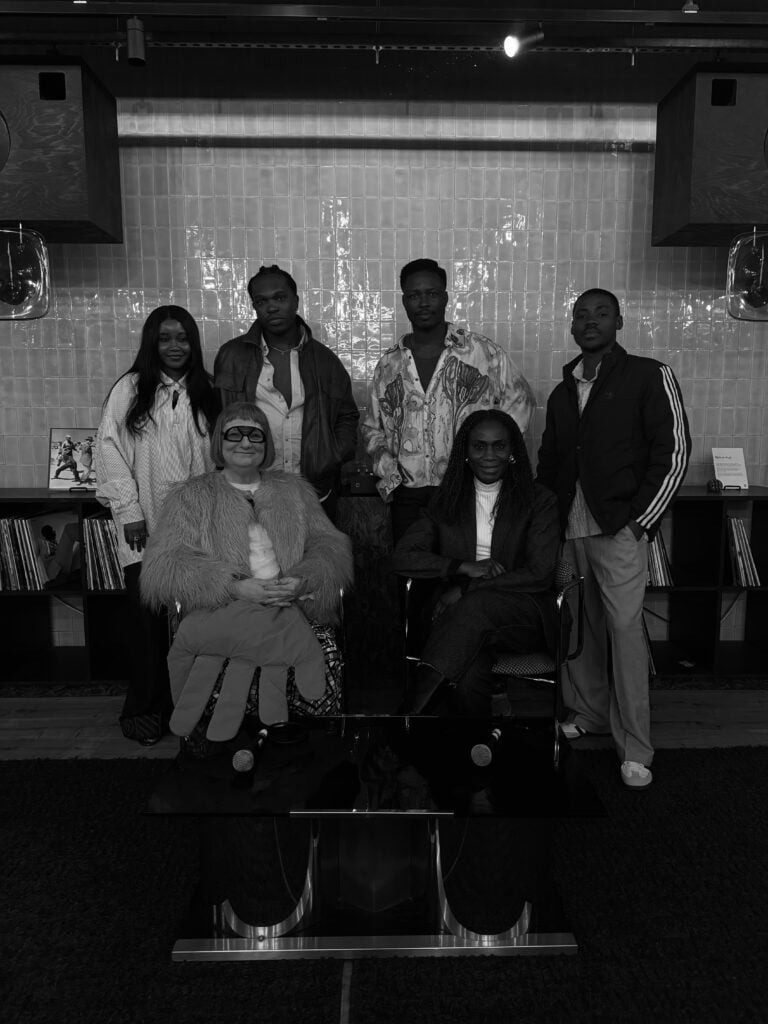 Inside Central Saint Martins’ Makers Camp: West African Makers in Focus 4 A group portrait of Berni Yates, Omoyemi Akerele, Travis Obeng-Casper, Adaeze Oguzie, Ugonna-Ora Owoh, and Peter Acha posing together in a studio setting at the Central Saint Martins Makers Camp.