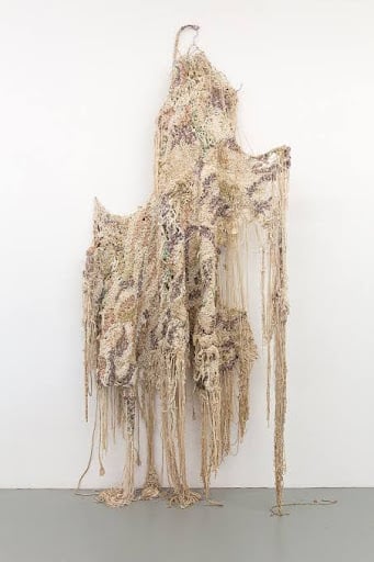Woven Stories: 9 African Artists Shaping Contemporary Narratives Through Textiles 6 Densely woven and beaded textile sculpture titled 'Ouma' (2016) by South African artist Igshaan Adams, highlighting contemporary African art.