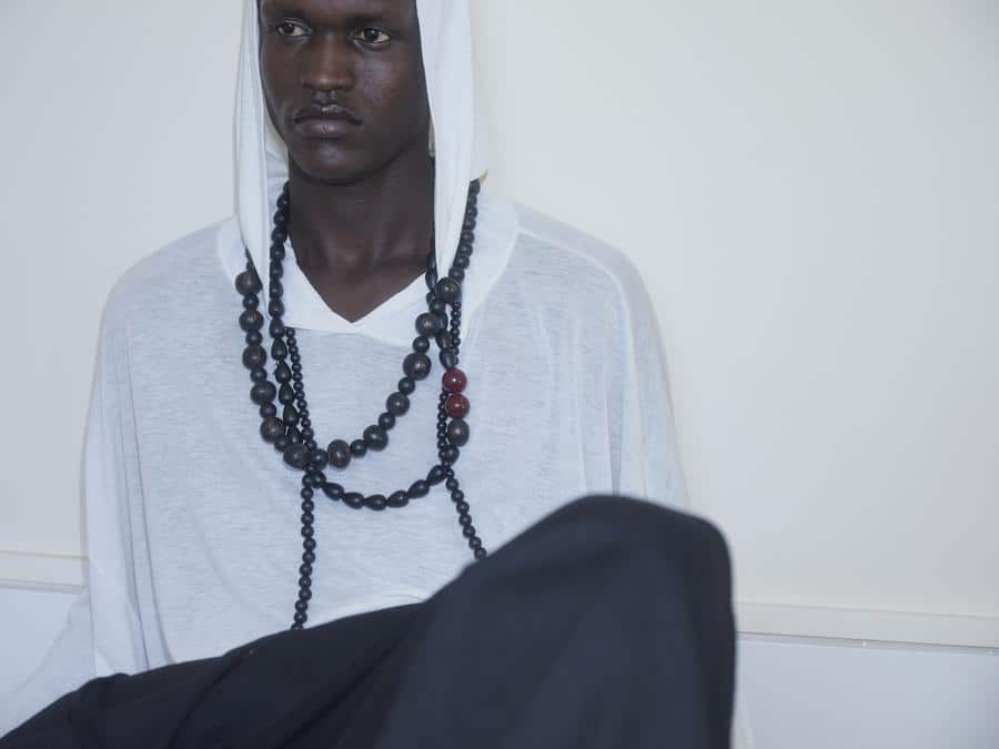Huguette Tchiapi's Debut Begins in Yaoundé 8 Detail of recycled glass beads from Ghana on a Numéro 01 look.