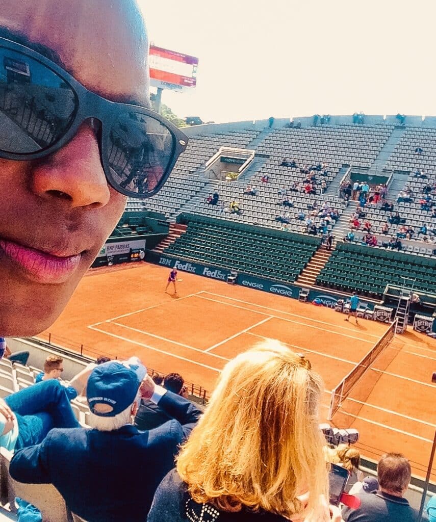 A spectator views Court Suzanne-Lenglen during Roland-Garros 2015, Paris.