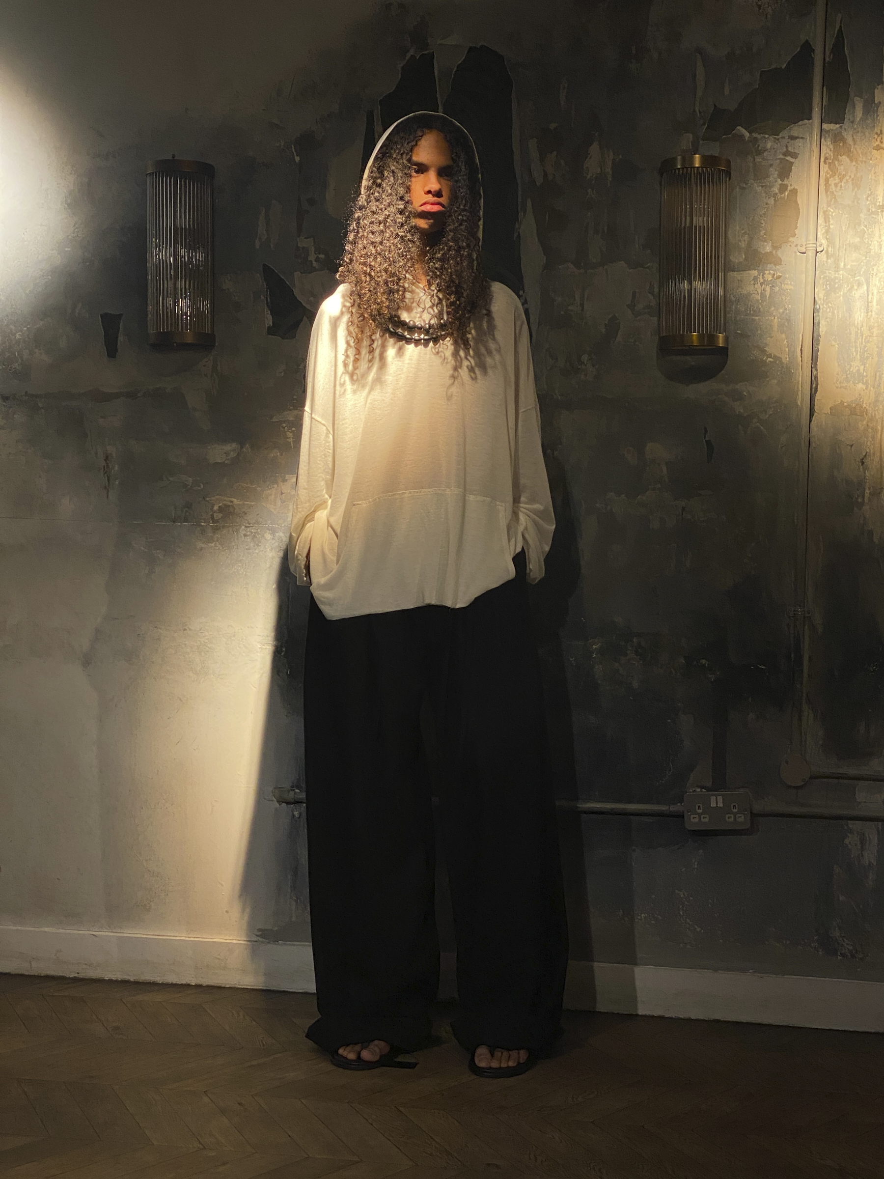Huguette Tchiapi's Debut Begins in Yaoundé 6 A hooded cotton look from Numéro 01 at the Scarlett Green presentation in Soho.
