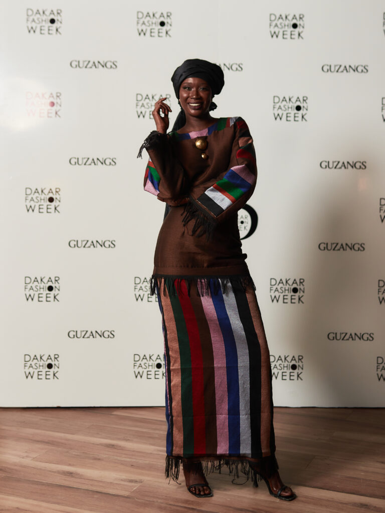Guest at the Guzangs Experience launch event for Dakar Fashion Week’s 25th edition in Dakar — photographed by Alexander Gandaho