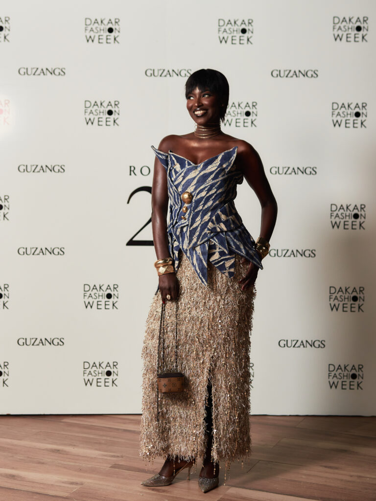 Guest at the Guzangs Experience launch event for Dakar Fashion Week’s 25th edition in Dakar — photographed by Alexander Gandaho