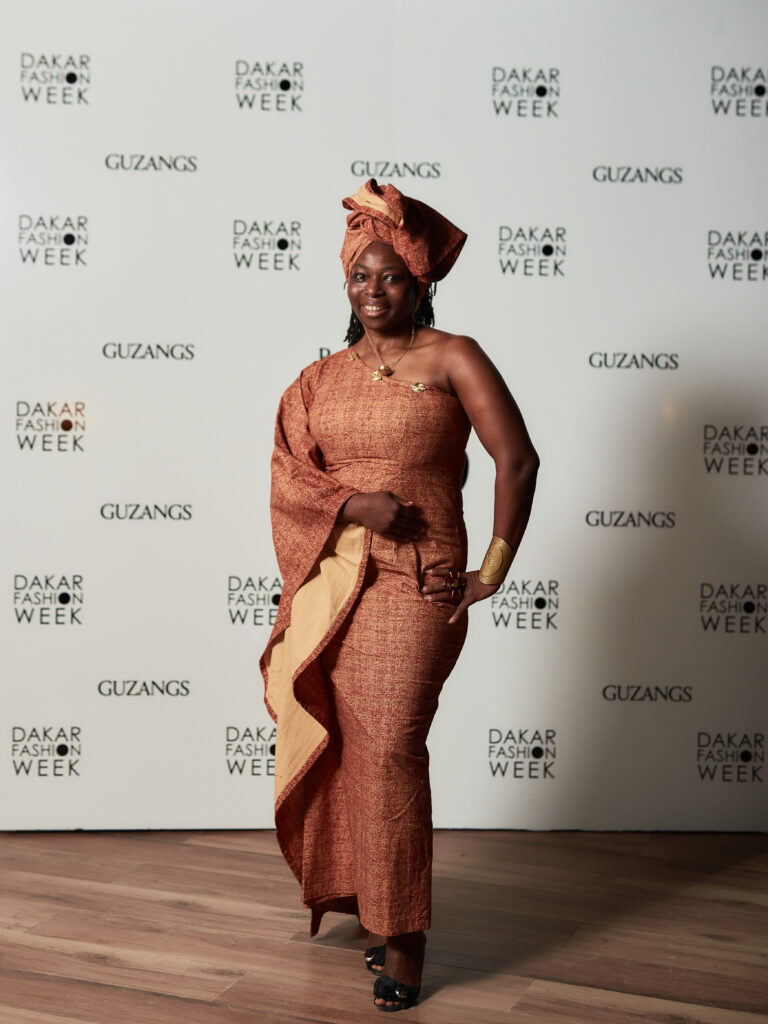 Guest at the Guzangs Experience launch event for Dakar Fashion Week’s 25th edition in Dakar — photographed by Alexander Gandaho