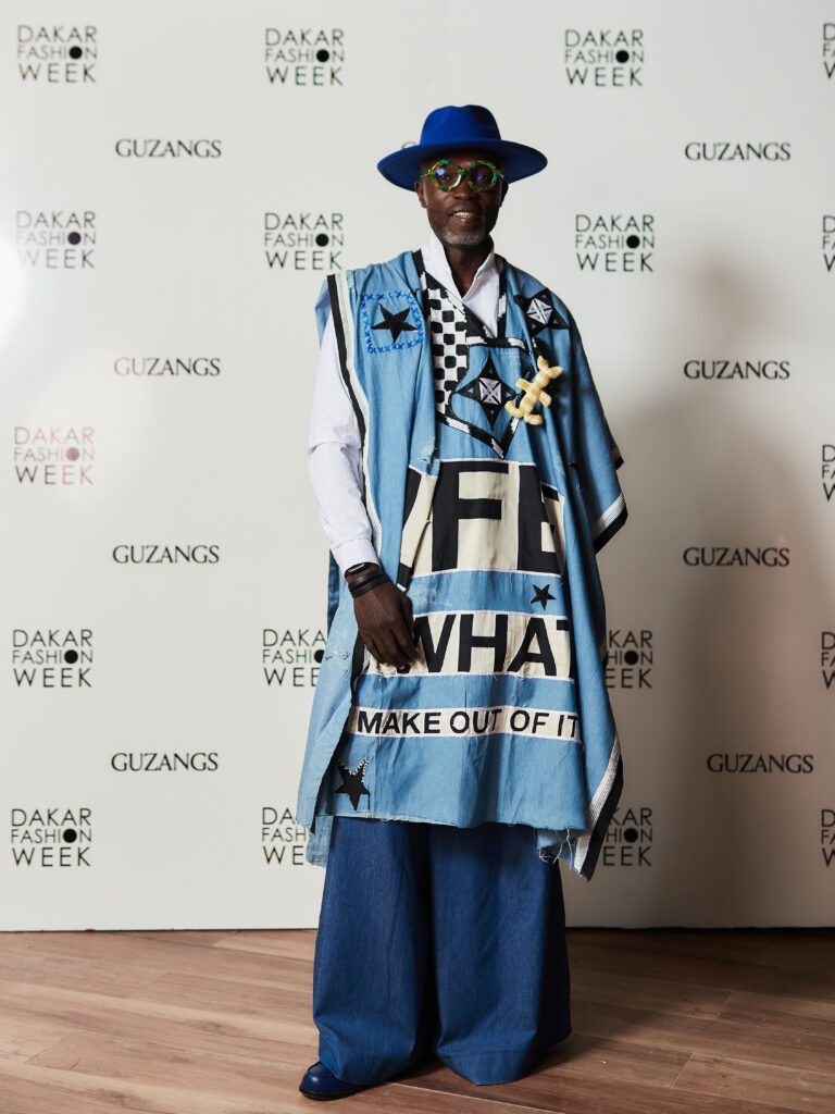 Guest at the Guzangs Experience launch event for Dakar Fashion Week’s 25th edition in Dakar — photographed by Alexander Gandaho