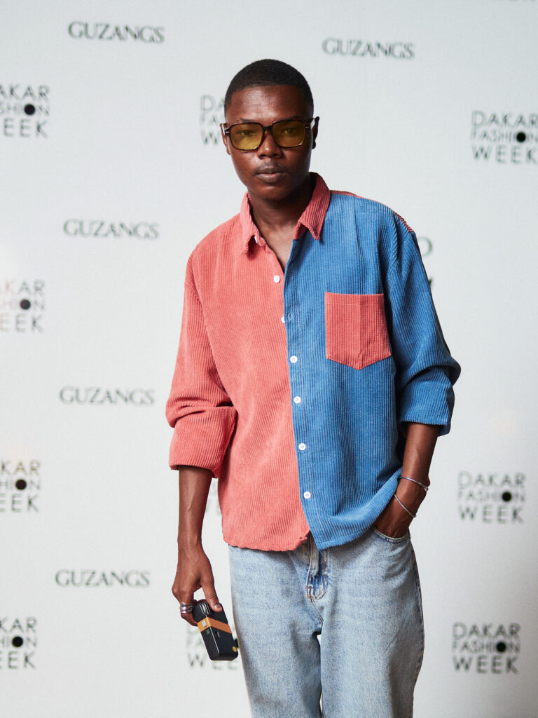 Guest at the Guzangs Experience launch event for Dakar Fashion Week’s 25th edition in Dakar — photographed by Alexander Gandaho