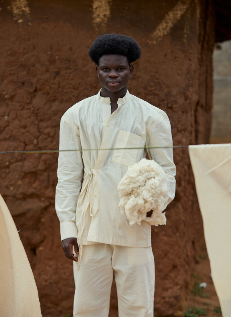 At BAKUS ORAYA, Cotton in Its Final State 5 Look 02 — Ivory Coat, Frayed Lapel.