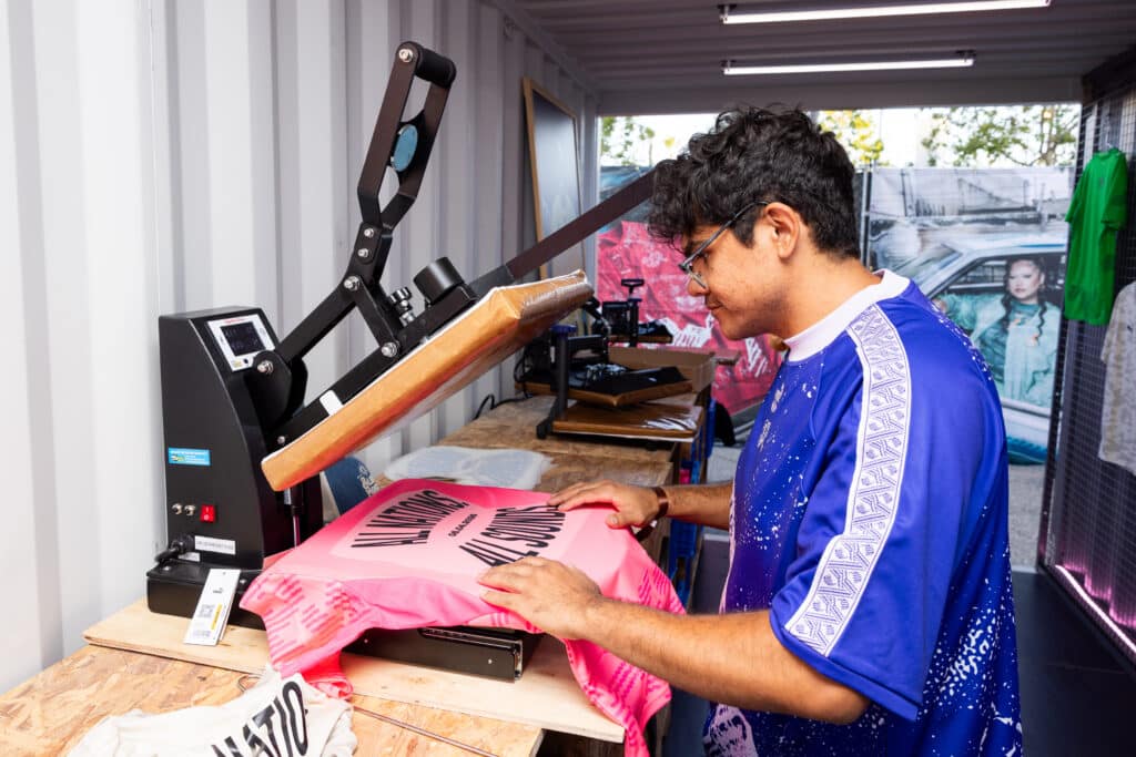Puma Brought the Continent to Downtown LA. The Postcards Were the Tell 3 A guest's custom Puma national team shirt being heat-pressed at the Salehe Bembury activation