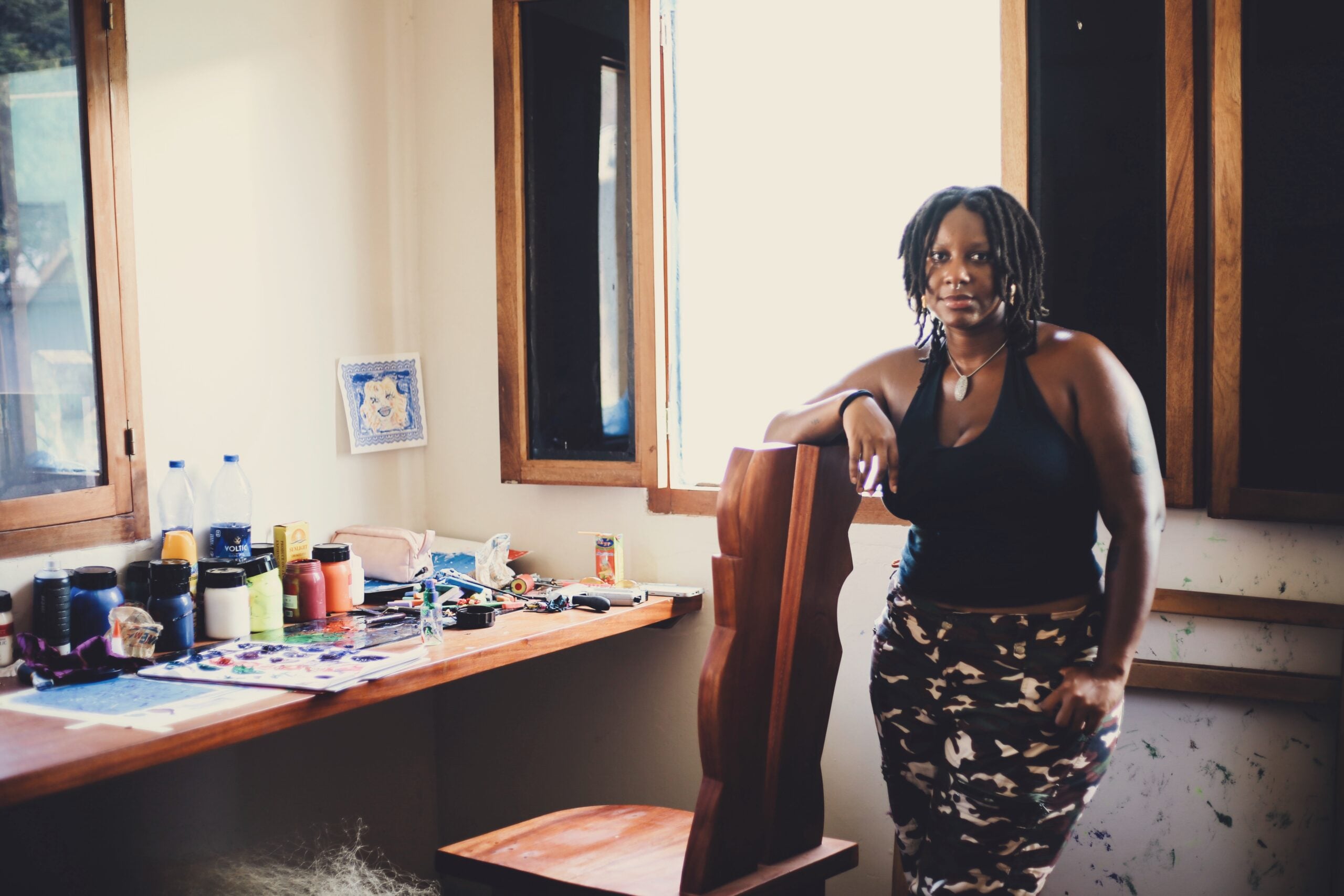 Portrait of Ghanaian artist Ewuresi Archer in her studio