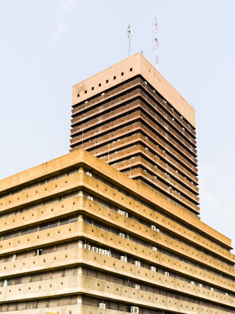 At MoMA, a New Exhibition Celebrates West Africa's Modernist Architectural Legacy 2 The modernist Alpha 2000 tower (Société Ivoirienne de Banque) in Abidjan, Côte d’Ivoire, designed by Bureaux d’Études Henri Chomette, 1974–76.