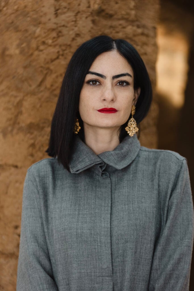 Portrait of curator Meriem Berrada, who brought Morocco to the Venice Biennale for the first time with the pavilion Asǝṭṭa. Photo by Ayoub El Bardii