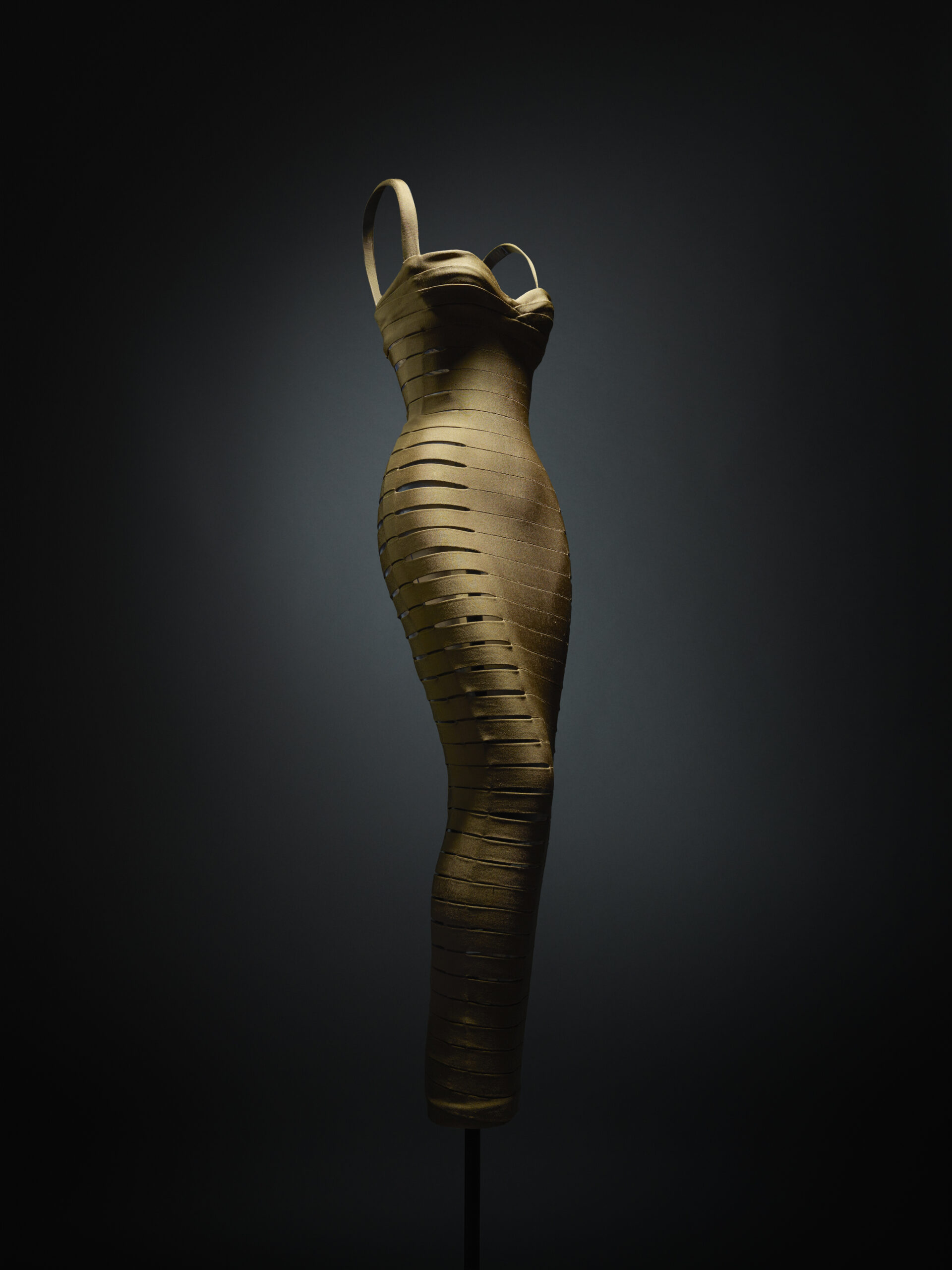 Azzedine Alaïa bronze bandage dress, Spring/Summer 1990, studio photograph on black ground