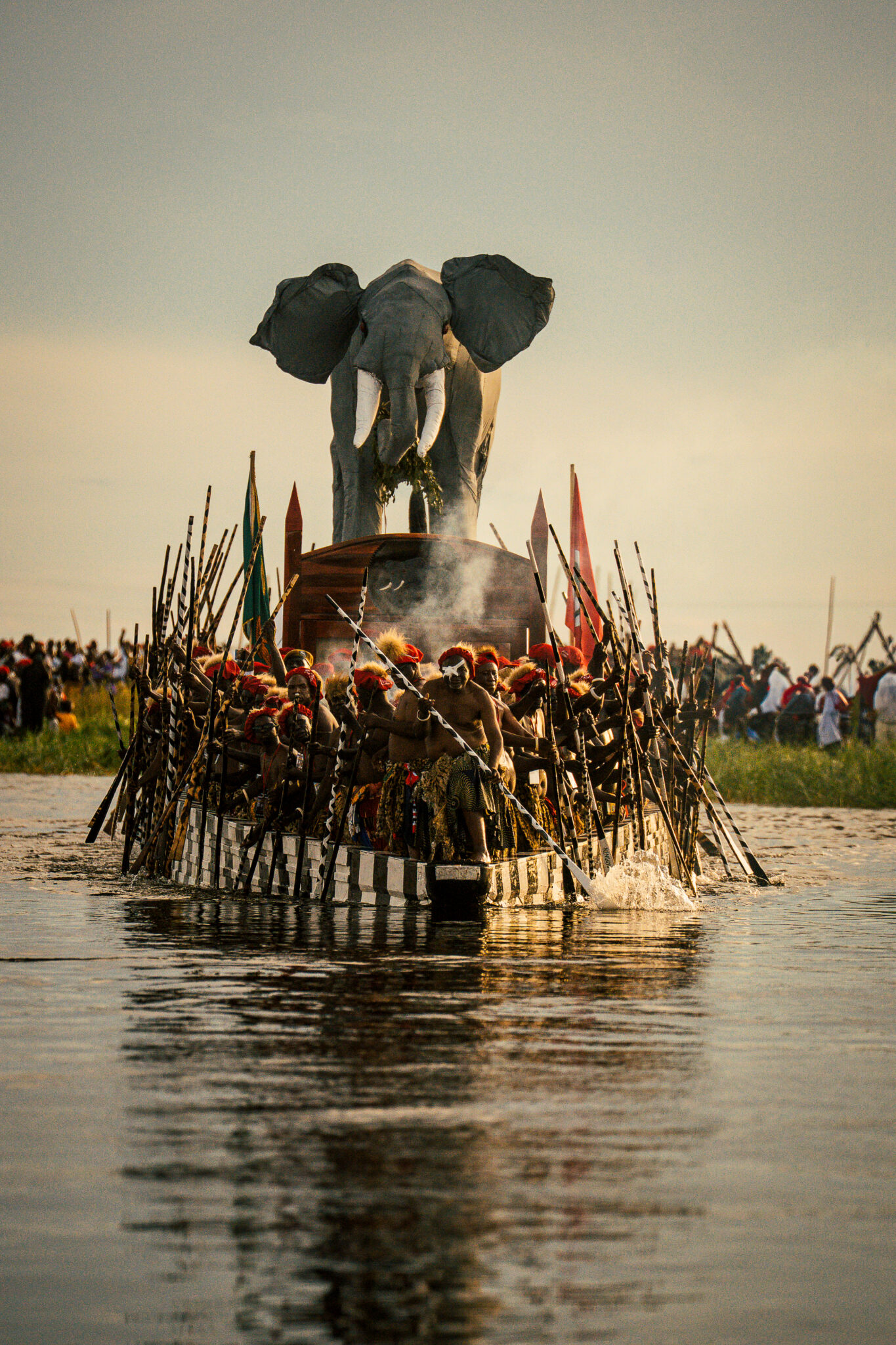 Six Days on the Zambezi: A Traveller's Guide to Kuomboka 6 The Nalikwanda, the Litunga's royal barge crowned by an elephant effigy with spears raised, crosses the flooded Barotse Plain during Kuomboka.
