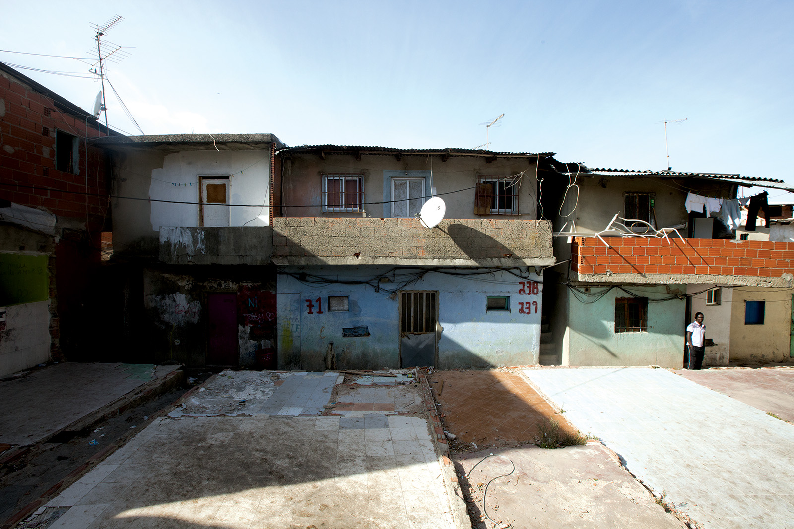 Informal houses and the tiled footprints of demolished homes in Bairro 6 de Maio, the Cape Verdean settlement outside Lisbon.