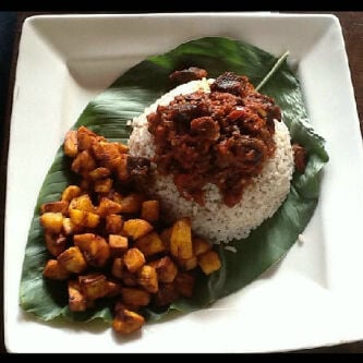 Akin Faminu on Style, Taste and the Things He Returns To 7 Plate of white rice with fried plantain and ofada sauce