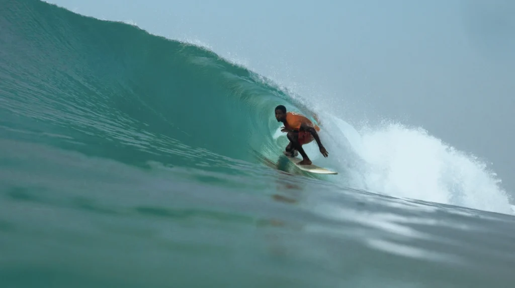 Home 1 In Côte d’Ivoire, a New Generation Learns to Read the Waves
