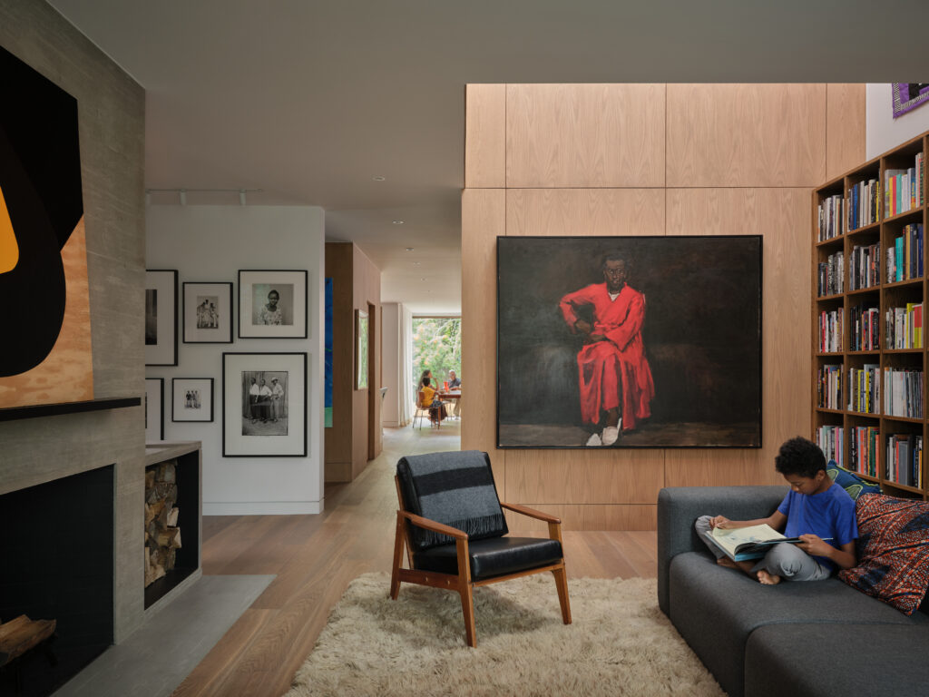 A reader in the library of Kenneth Montague's home in Toronto