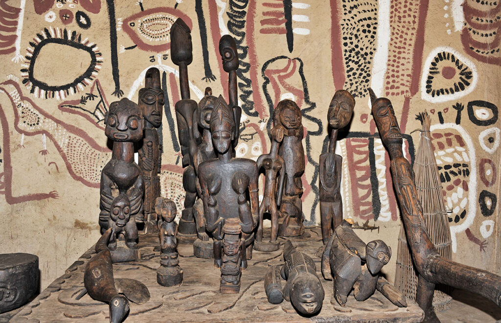Interior of Susanne Wenger's house with a sculpted piece dedicated to the river goddess Osun