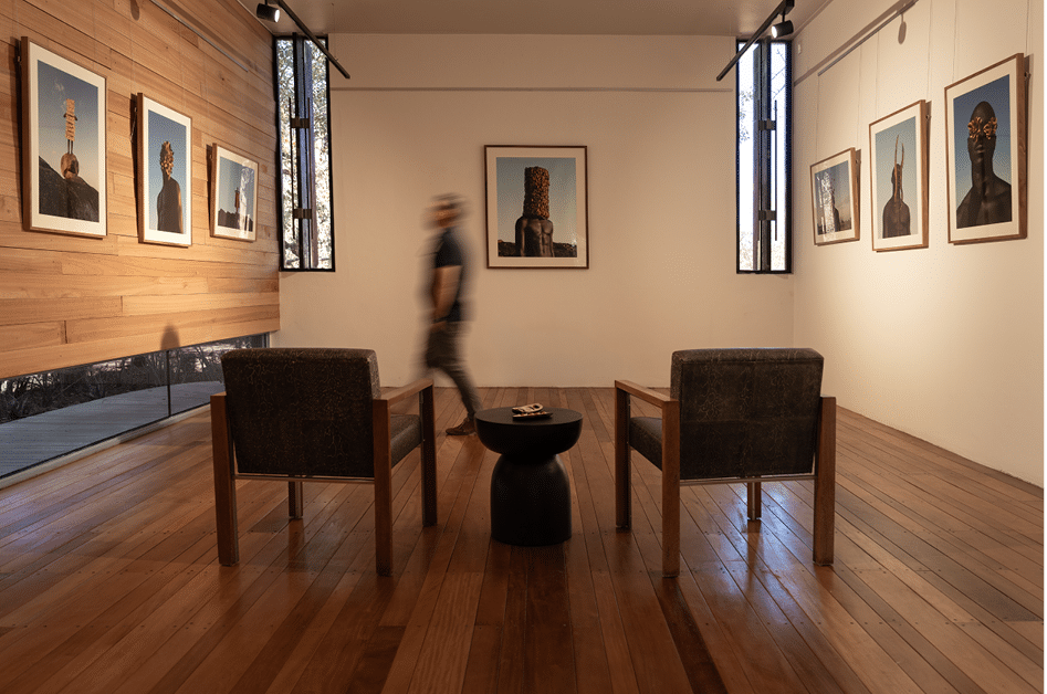 The Seedpod and the Skin 1 Installation view of Tatenda Chidora's Metamorphosis at Singita Kruger National Park, with framed mask portraits hung in a timber-panelled gallery