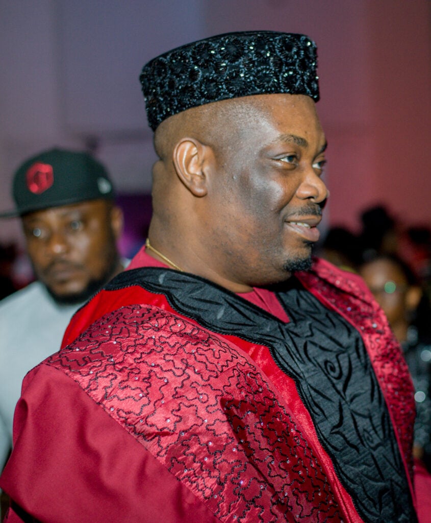 Mavin Records founder Don Jazzy wearing a red embroidered outfit and black cap at the 2020 Africa Magic Viewers’ Choice Awards.