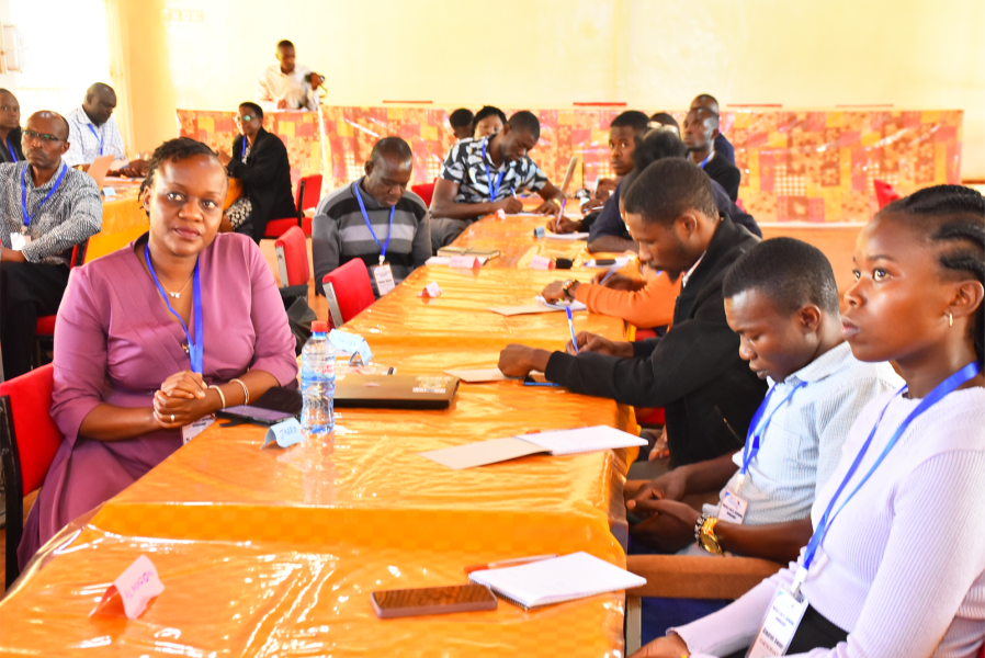 Lilian Wanzare, wearing purple, listens with participants at a language-data licensing workshop at Maseno University, Kenya.