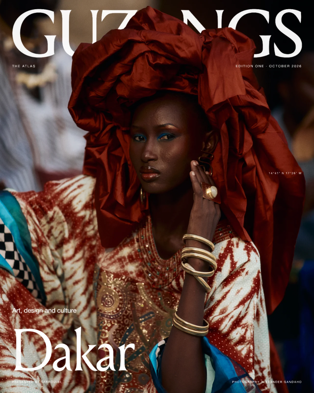 Guzangs Atlas: Dakar cover, featuring a model in a sculptural rust-coloured headwrap, with the masthead and cover typography intact.