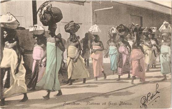 Historical image of women in Zanzibar wearing long garments made from Amerikani cloth.